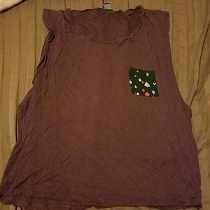 Loose fitted purple tank with a pocket